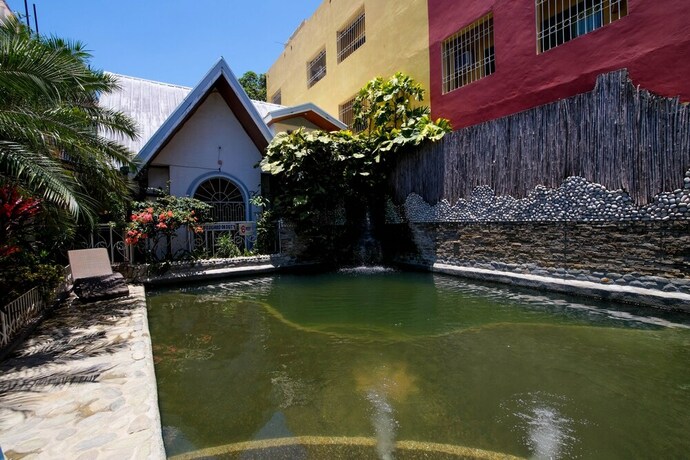 Imagen de la piscina del Hotel ZEN Rooms White Beach. Foto 19