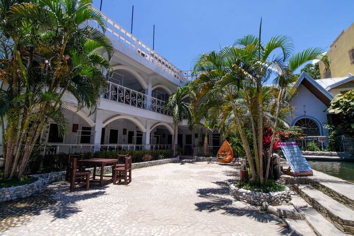 Imagen de los exteriores del Hotel ZEN Rooms White Beach. Foto 15