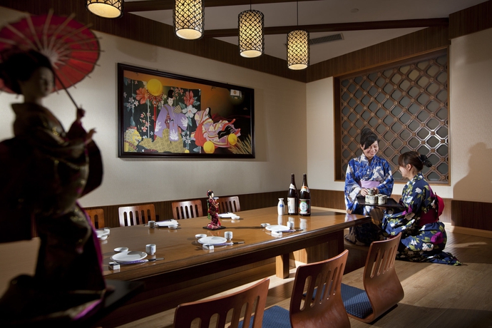 Imagen del bar/restaurante del Hotel ZHEJIANG GRAND. Foto 3