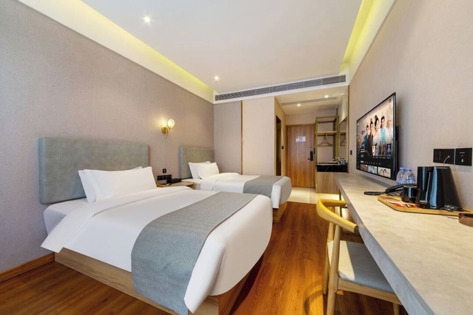 Imagen de la habitación del Hotel ZHONG SHAN HAI BIN. Foto 7