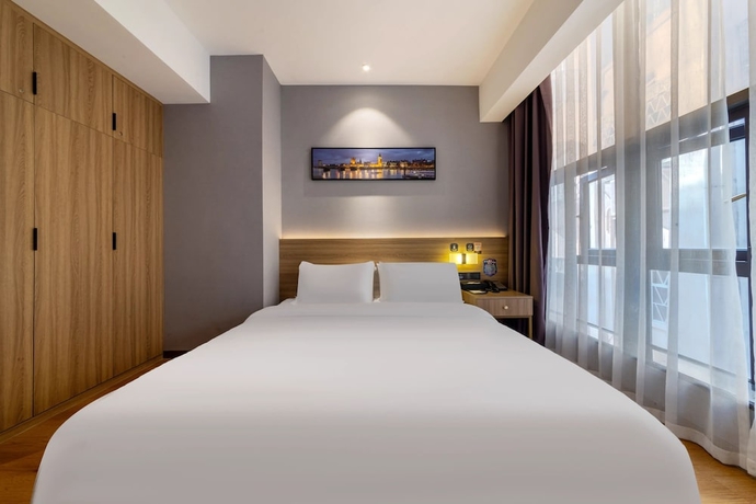 Imagen de la habitación del Hotel ZHONG SHAN HAI BIN. Foto 11