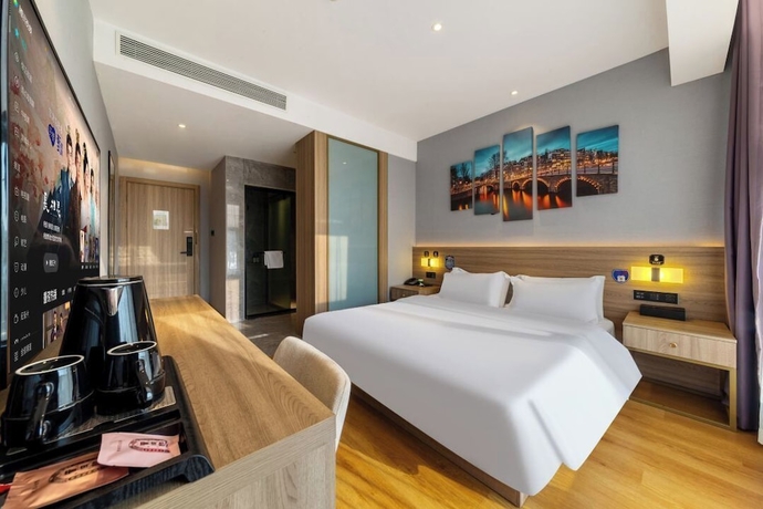 Imagen de la habitación del Hotel ZHONG SHAN HAI BIN. Foto 13