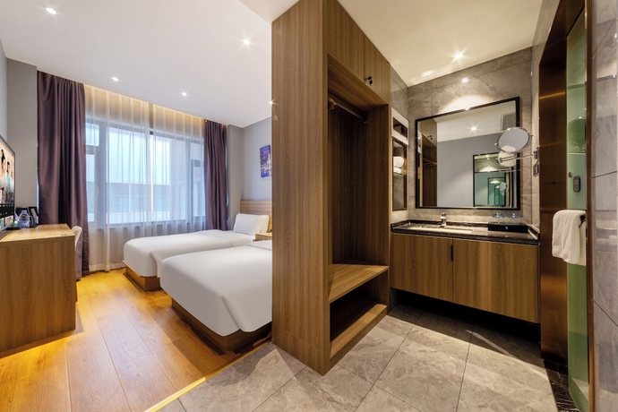 Imagen de la habitación del Hotel ZHONG SHAN HAI BIN. Foto 16