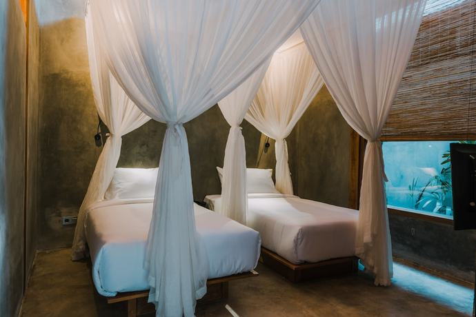 Imagen de la habitación del Hotel ZIN Canggu Resort and Villas. Foto 9