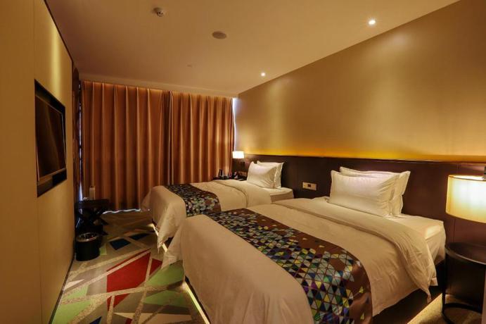 Imagen de la habitación del Hotel ZMAX FOSHAN QIAN DENG HU. Foto 5