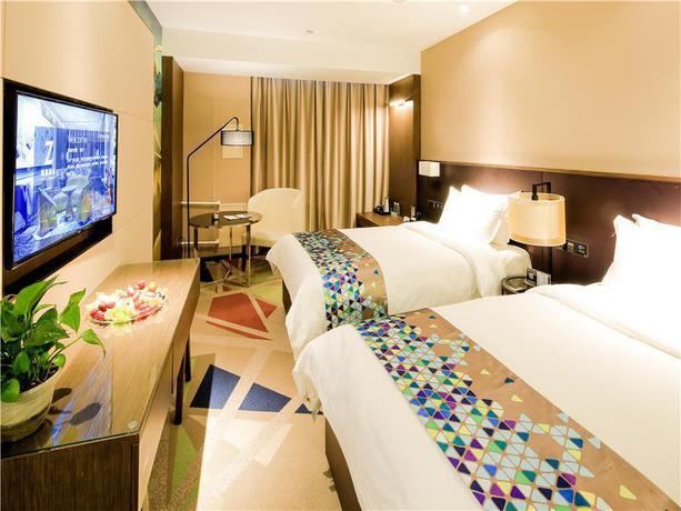 Imagen de la habitación del Hotel ZMAX HOTELA HARBIN BINGXUE BIG WORLD. Foto 8