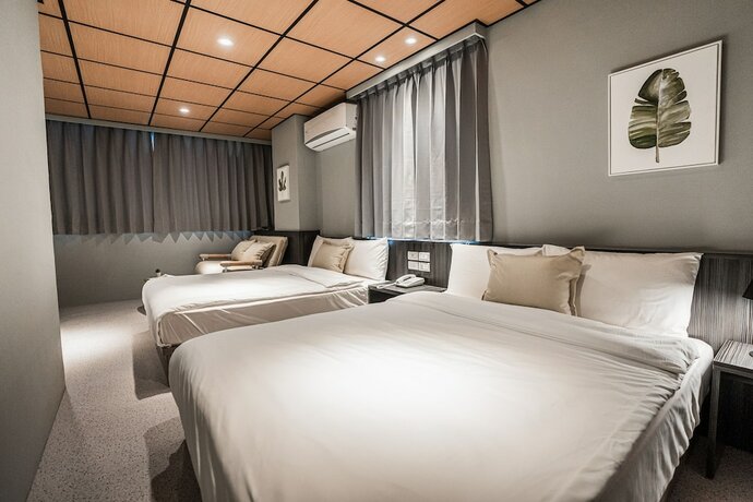 Imagen de la habitación del Hotel ZZ Inn. Foto 16