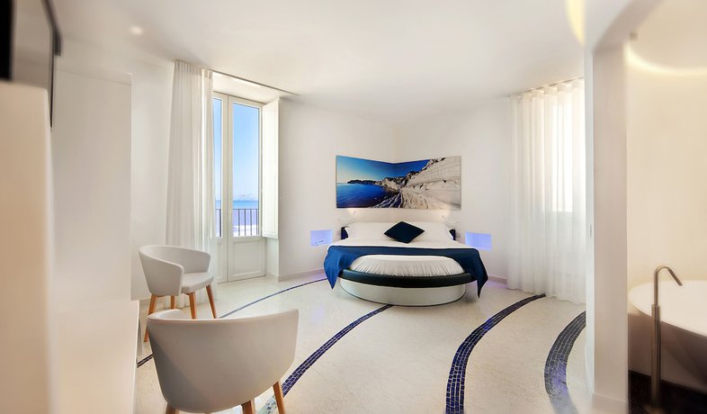 Imagen de la habitación del Hotel Zafran Boutique. Foto 17