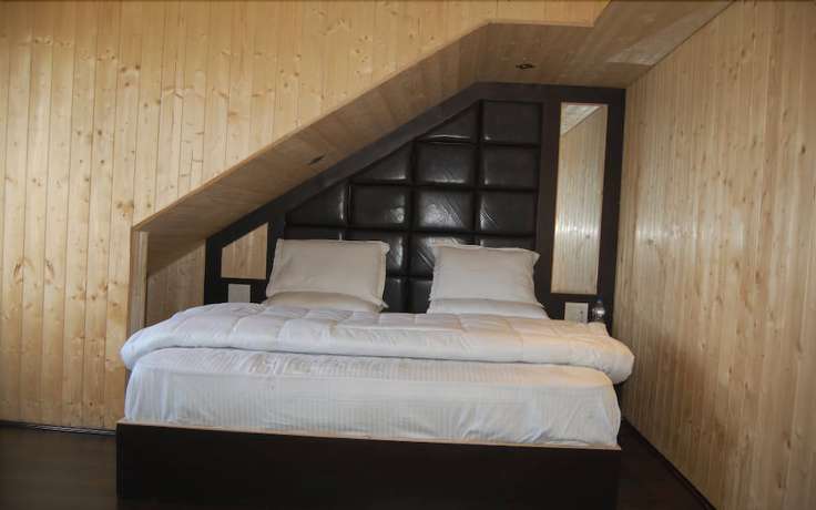 Imagen de la habitación del Hotel Zahgeer Continental Gulmarg. Foto 11