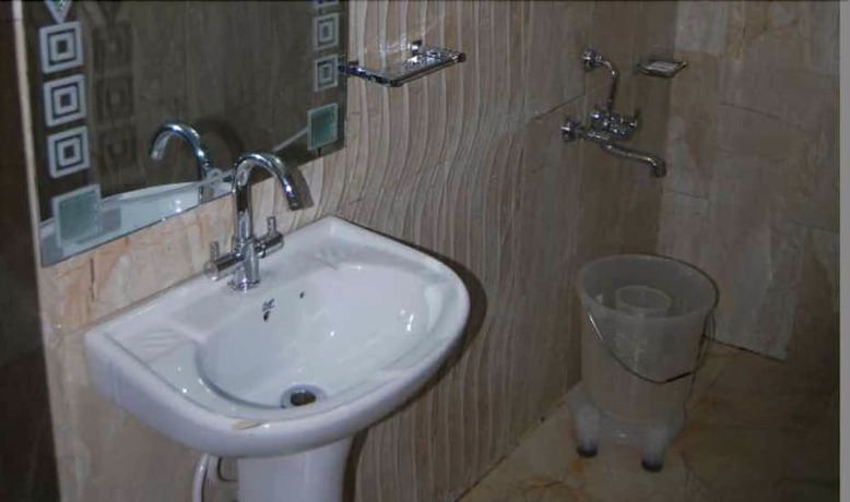 Imagen de la habitación del Hotel Zahgeer Continental Gulmarg. Foto 12