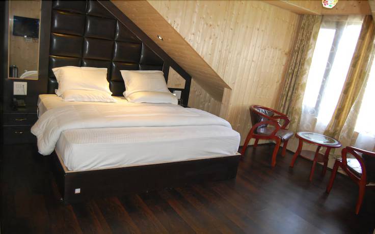 Imagen de la habitación del Hotel Zahgeer Continental Gulmarg. Foto 13