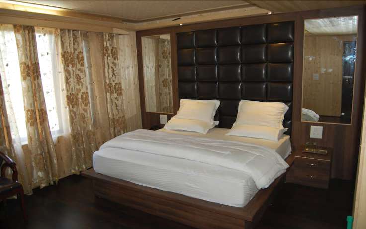 Imagen de la habitación del Hotel Zahgeer Continental Gulmarg. Foto 16