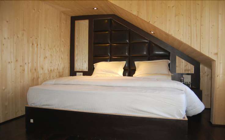 Imagen de la habitación del Hotel Zahgeer Continental Gulmarg. Foto 18