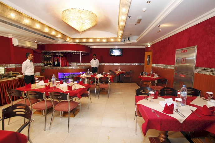 Imagen del bar/restaurante del Hotel Zain International. Foto 5