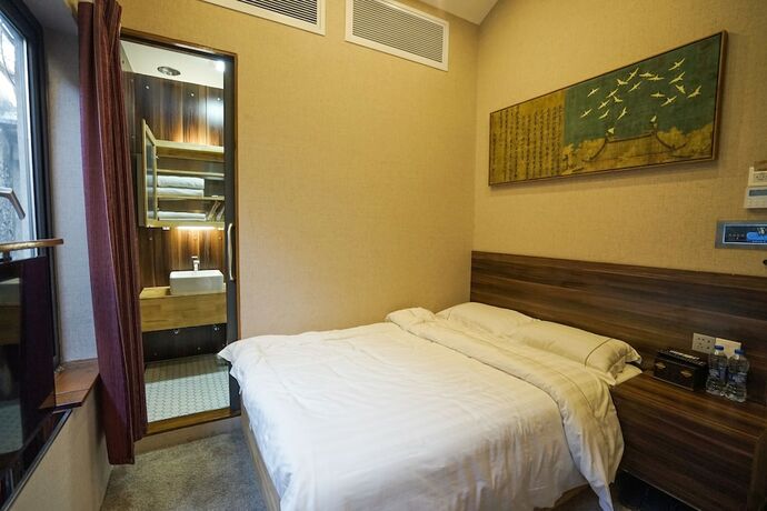 Imagen de la habitación del Hotel Zaiyang Inn. Foto 16