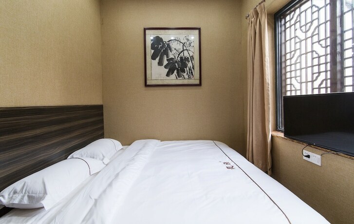 Imagen de la habitación del Hotel Zaiyang Inn. Foto 18