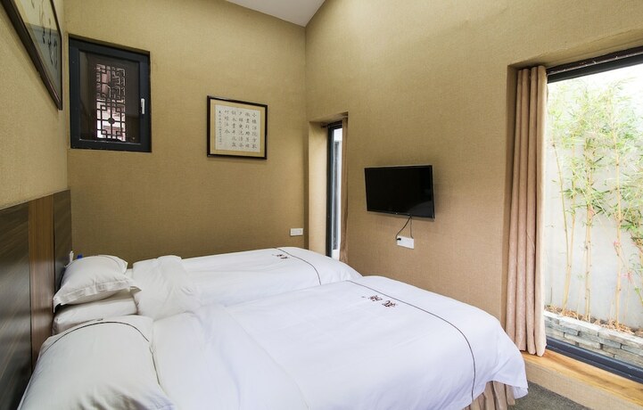 Imagen de la habitación del Hotel Zaiyang Inn. Foto 21