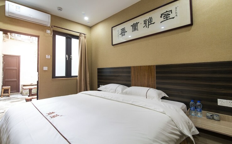Imagen de la habitación del Hotel Zaiyang Inn. Foto 22