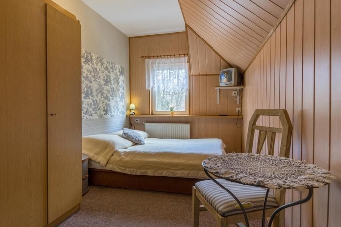 Imagen de la habitación del Hotel Zając&oacute;wka leśna enklawa w centrum miasta. Foto 11