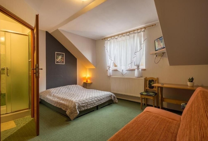 Imagen de la habitación del Hotel Zając&oacute;wka leśna enklawa w centrum miasta. Foto 14