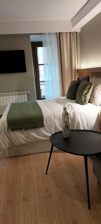 Imagen de la habitación del Hotel Zalle Oviedo Suites. Foto 11