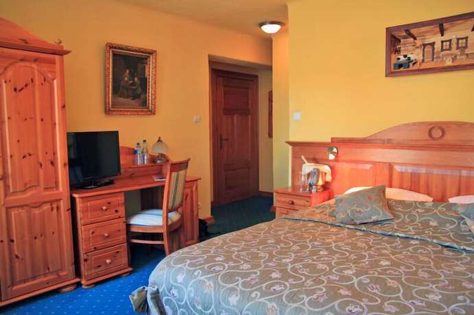 Imagen de la habitación del Hotel Zamkowy. Foto 11