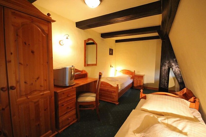 Imagen de la habitación del Hotel Zamkowy. Foto 13