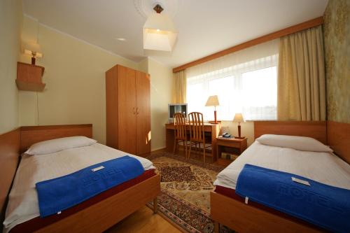 Imagen de la habitación del Hotel Zamkowy, Slupsk. Foto 10