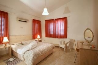 Imagen de la habitación del Hotel Z&X Holiday Villas. Foto 2