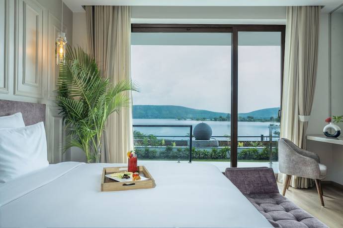 Imagen de la habitación del Hotel Zana Lake Resort Udaipur. Foto 6