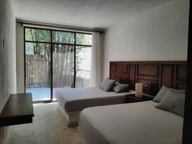 Imagen de la habitación del Hotel Zanara Boutique. Foto 10