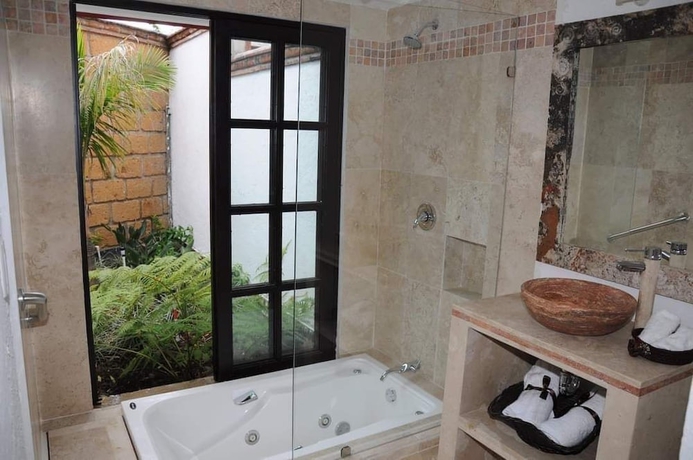 Imagen de la habitación del Hotel Zanara Boutique. Foto 13