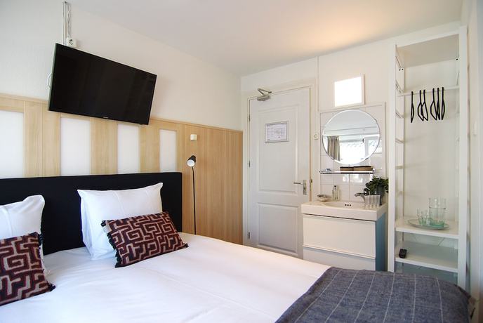 Imagen de la habitación del Hotel Zand. Foto 14