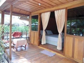 Imagen de la habitación del Hotel Zanom Sunrise Beach Resort. Foto 13