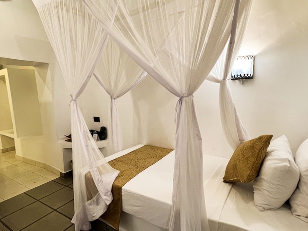 Imagen de la habitación del Hotel Zanzi House. Foto 12