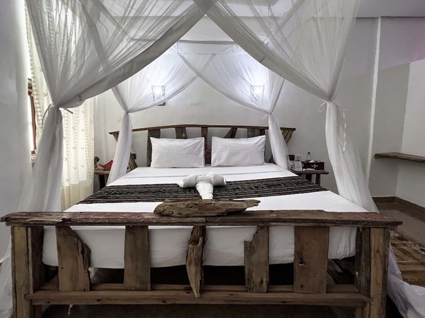 Imagen de la habitación del Hotel Zanzi House. Foto 13