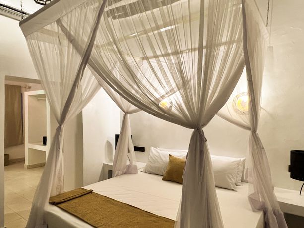 Imagen de la habitación del Hotel Zanzi House. Foto 17