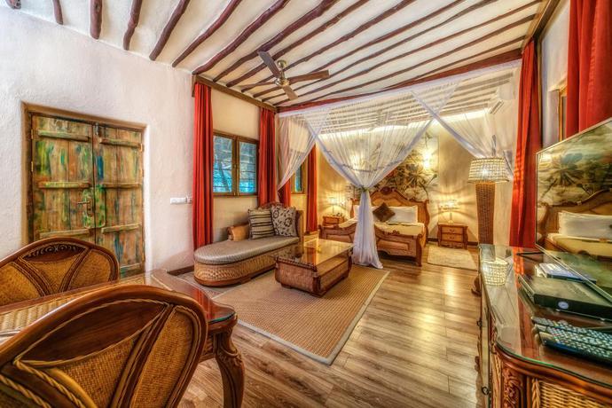 Imagen de la habitación del Hotel Zanzi Resort. Foto 16