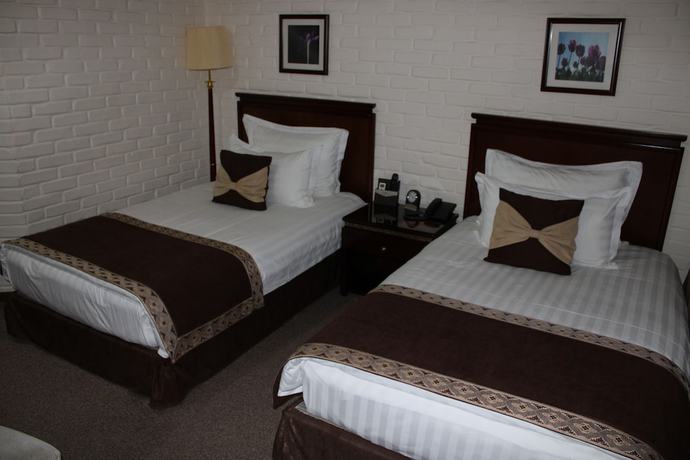 Imagen de la habitación del Hotel Zarafshan Grand Hotel. Foto 2