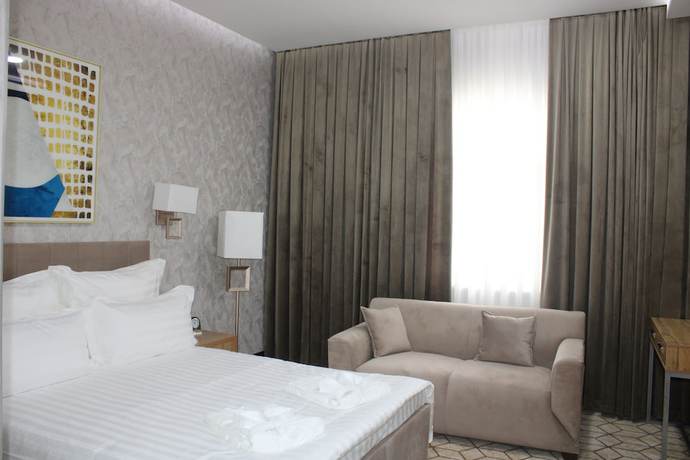 Imagen de la habitación del Hotel Zarafshan Grand Hotel. Foto 6