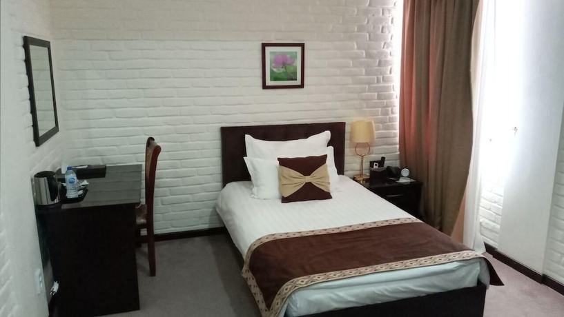 Imagen de la habitación del Hotel Zarafshan Grand Hotel. Foto 9