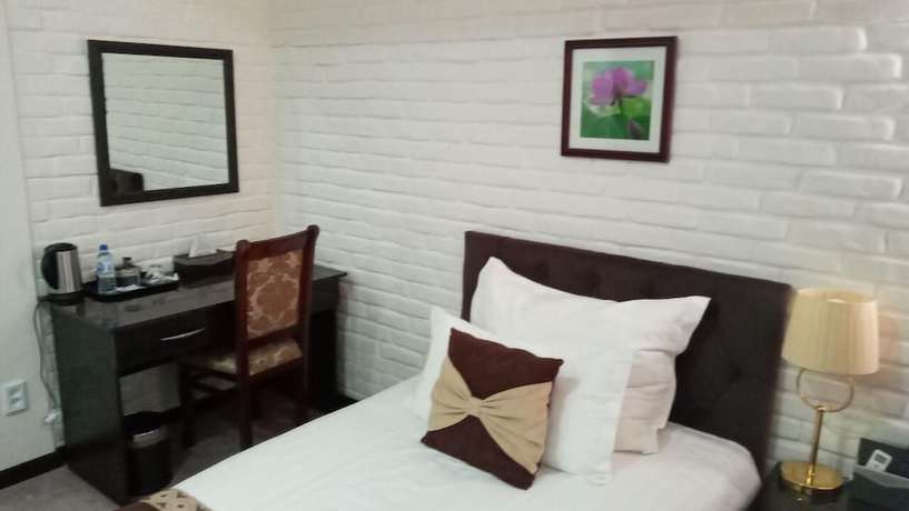 Imagen de la habitación del Hotel Zarafshan Grand Hotel. Foto 10