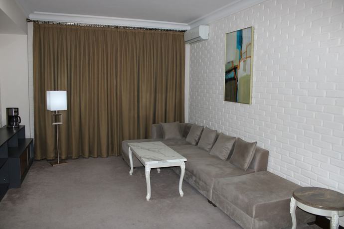 Imagen de la habitación del Hotel Zarafshan Grand Hotel. Foto 11