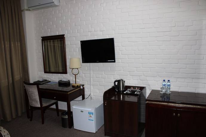 Imagen de la habitación del Hotel Zarafshan Grand Hotel. Foto 12