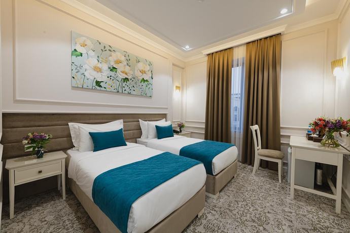 Imagen de la habitación del Hotel Zarafshon Parkside. Foto 15