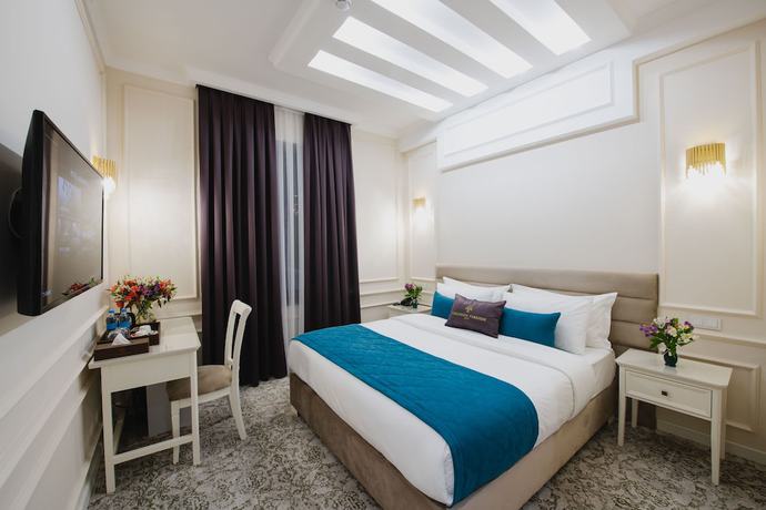 Imagen de la habitación del Hotel Zarafshon Parkside. Foto 16