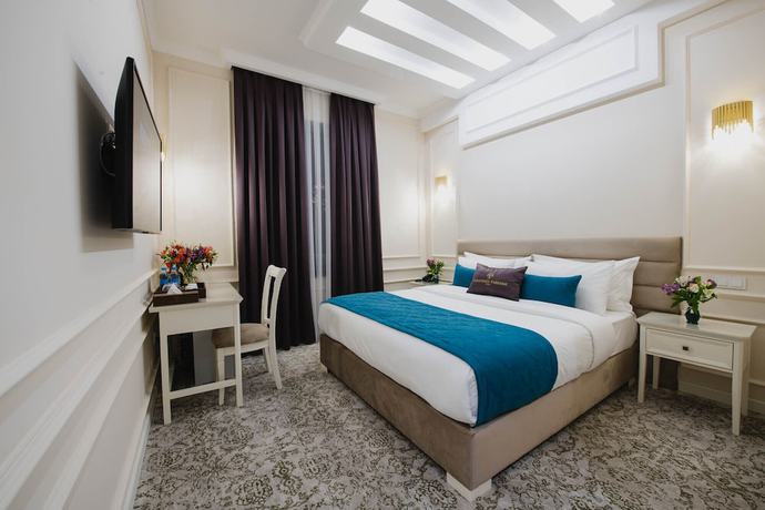 Imagen de la habitación del Hotel Zarafshon Parkside. Foto 18