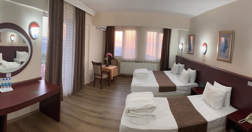 Imagen de la habitación del Hotel Zarha Mountain Resort. Foto 9