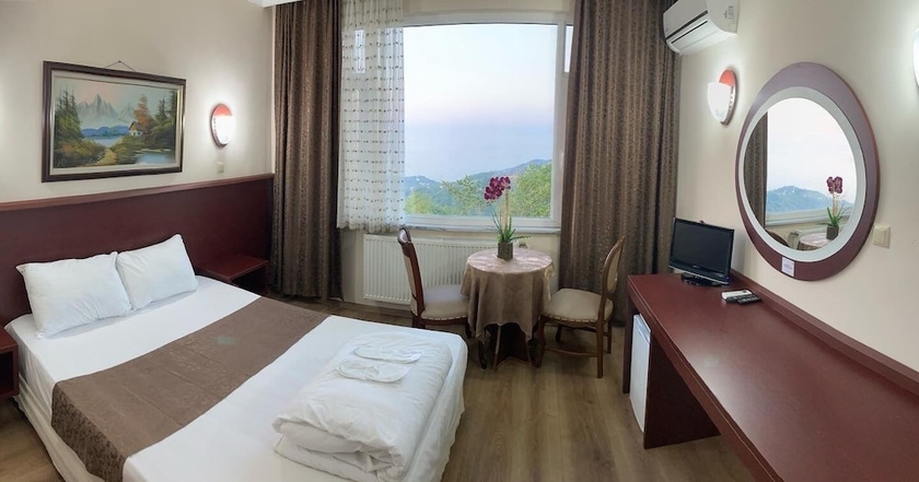 Imagen de la habitación del Hotel Zarha Mountain Resort. Foto 11