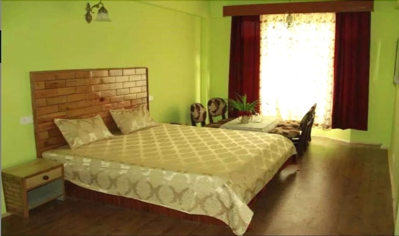 Imagen de la habitación del Hotel Zarim Manali. Foto 8